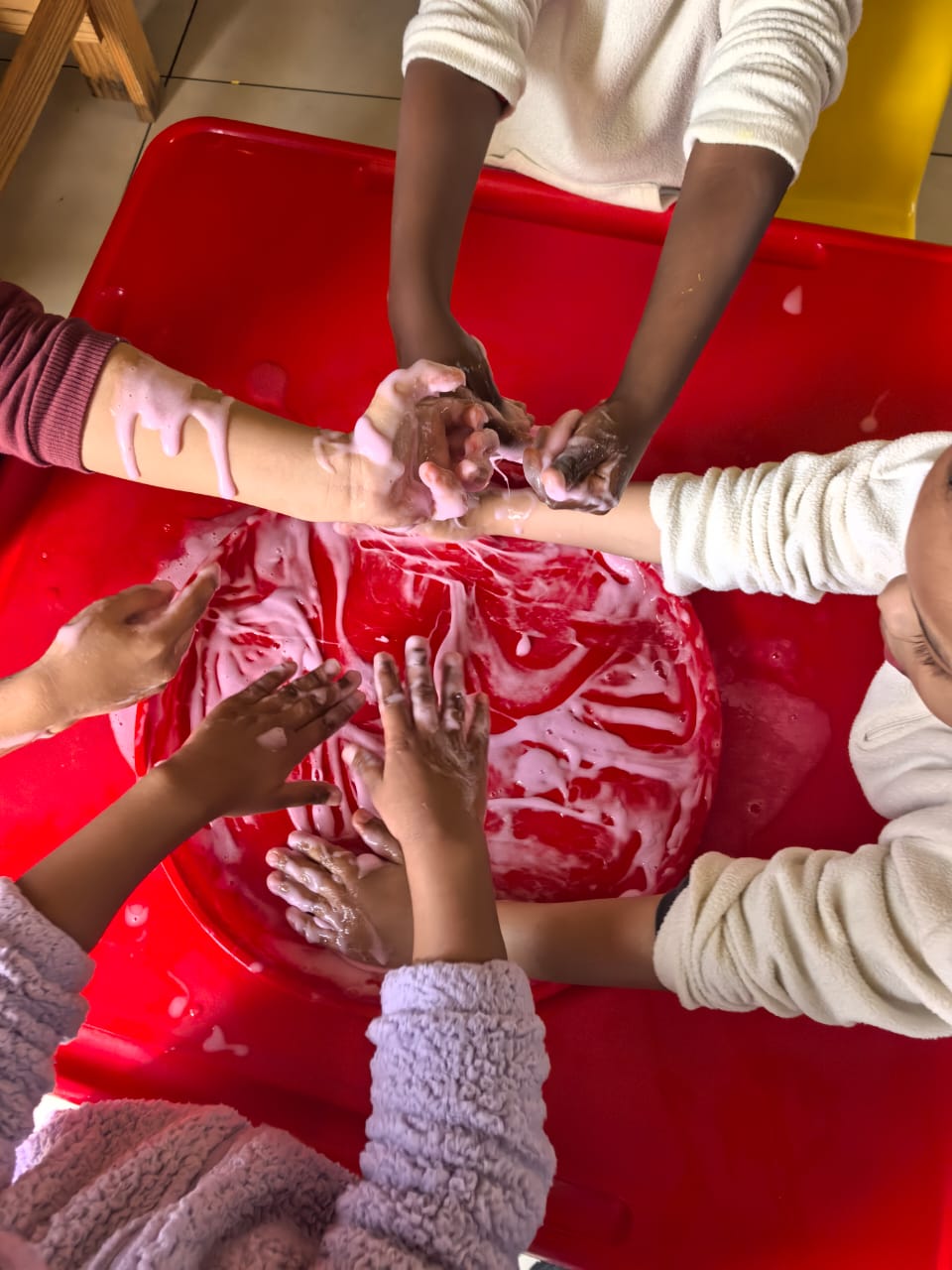 Children engaged in sensory play